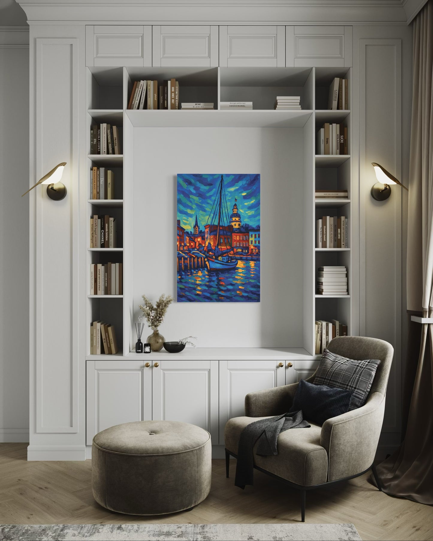 A framed artwork hanging in a white built-in shelving nook above a cozy reading chair. The room features warm neutral tones and classic architectural details.