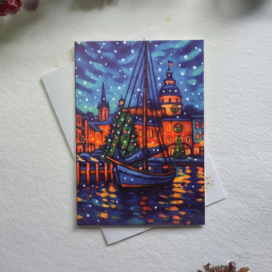 Colorful painting of a cityscape with a boat on a white surface with decorative elements.