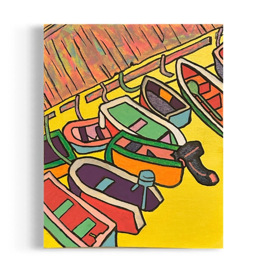 A colorful acrylic painting by Andrew French featuring small boats docked along a wooden pier, viewed from above. The piece bursts with yellow, orange, green, and purple tones, evoking the warmth and movement of a Chesapeake marina.