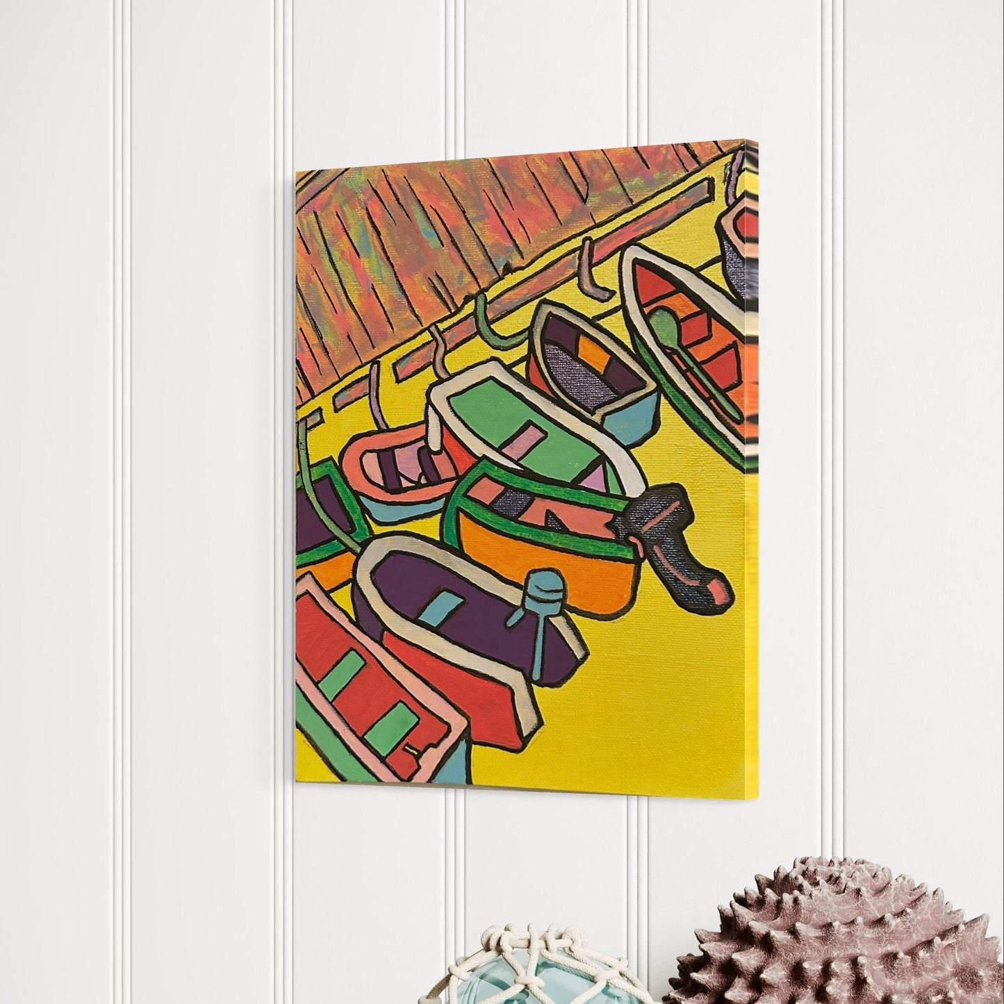 Side view of “Harbor” by Andrew French on a white paneled wall, showing the texture of the acrylic paint and vibrant maritime colors.